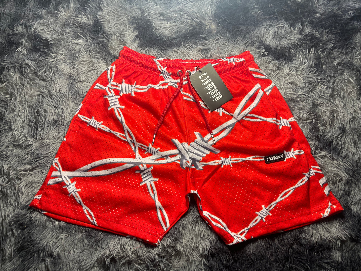 BARBED WIRE MESH SHORTS - RED